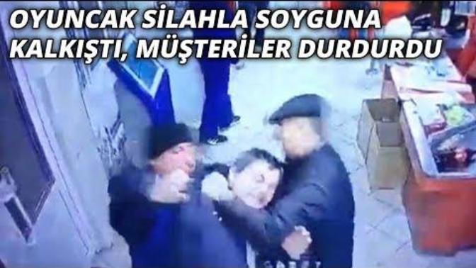 Oyuncak Silahla Market Soymaya Kalkışan Adamı Müşteriler Durdurdu!