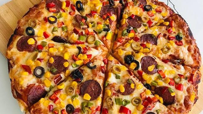 İtalya'nın Vazgeçilmez Yemeği: Mükemmel Pizza Tarifi