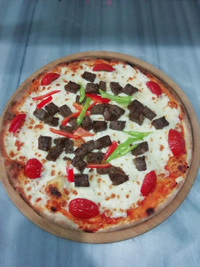 Sizce hangisi en güzel pizza olmuş?