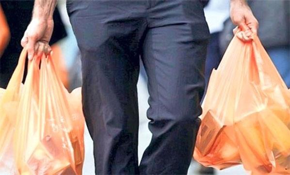 Etkilenen dirseğe önce hafif ağırlıklar ile poşet taşıma