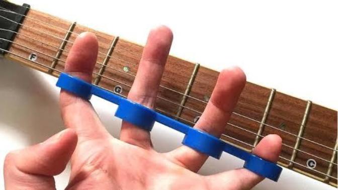 Gitar perdesine parmağım yetmiyor. Tavsiyeniz var mı?