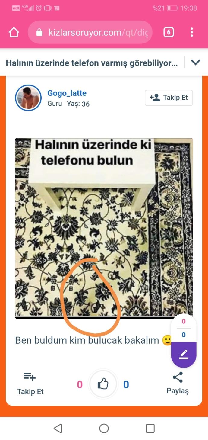 Halının üzerinde telefon varmış görebiliyor musunuz?