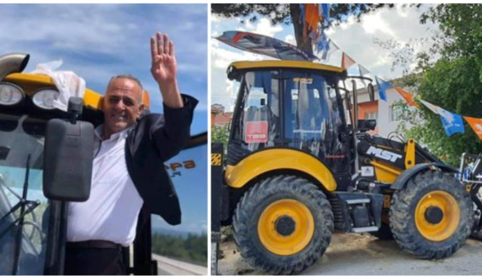 AK Parti adayının iş makinesinin üzerinde verdiği poz seçime gidecek ilçede tartışma yaratı. Bu görüntülere sizin yorumunuz nedir?