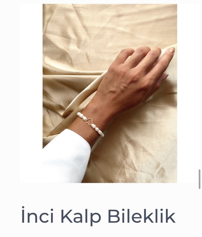 Kırmızı bir elbiseye inci kolye güzel olur mu?