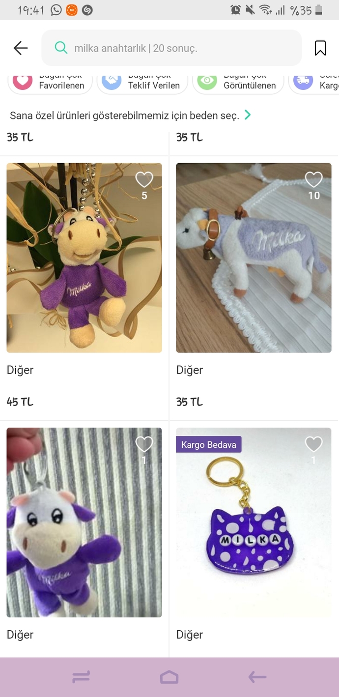 Milka çikolatanın yanındaki anahtarlık ineklerden gördünüz müü?