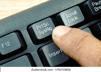 "PrtSc SysRq" (Print Screen)