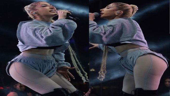 Dokuz Eylül Üniversitesi öğrencileriyle buluşan Hande Yener'in mini şortlu kombini nasıl?
