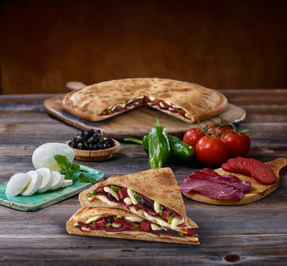 Detayada bakın. Pizzada gaz yapan malzeme ya da  pişirim tekniği hangisidir?