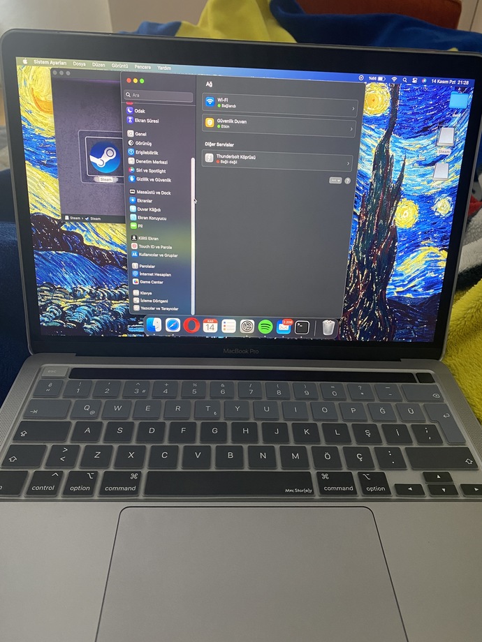 Macbook sistem tercihleri sekmesinin ilk görünüşü değişti ve çok karışık geliyor eski görünüşe nasıl çevirebilirim?