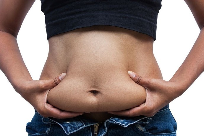 Ne yersem vücuduma dağılmıyor, sadece göbek ve bel kısmı oluyor. Nedeni nedir?