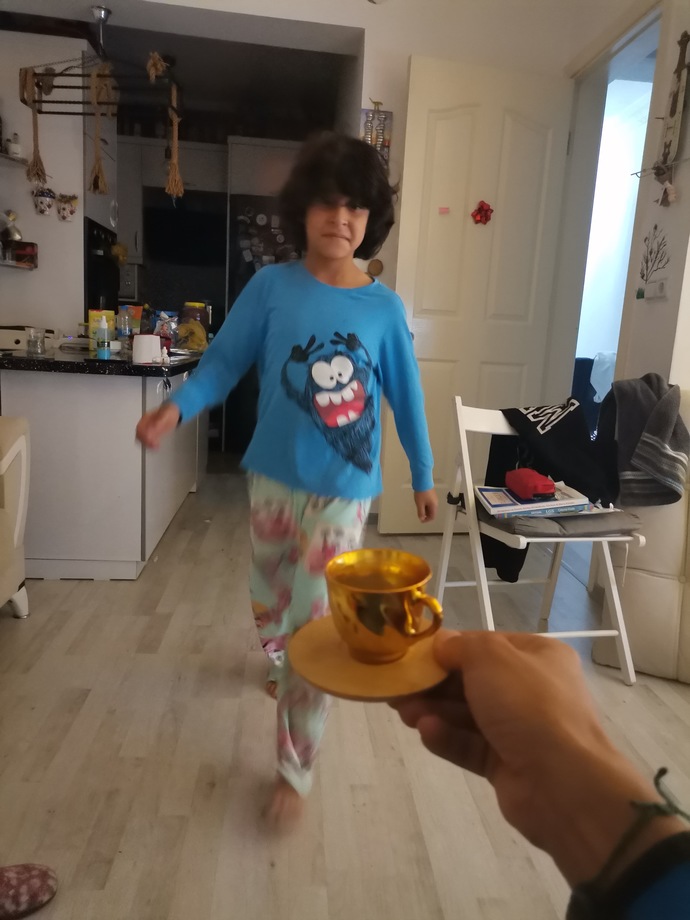 İ