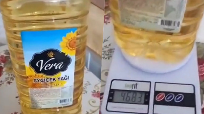 5 litre yağın 5 KG gelmediğini görüp yetkilileri göreve davet eden vatandaş! :D 5 litre yağ 5 kilo mu gelmeli?