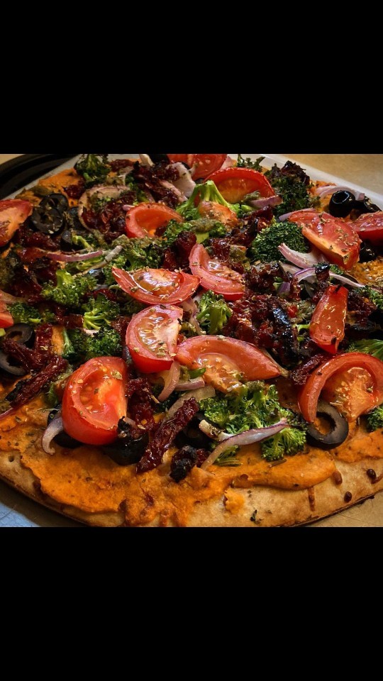 Domatesli pizza sever misiniz?