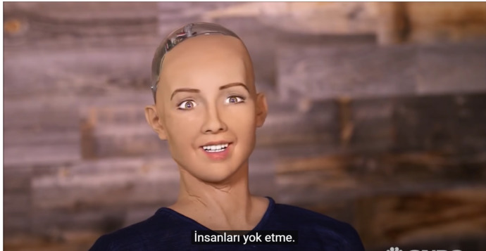 insanları yok edeceğini söyledikten sonra mutlu yüz ifadesini çalıştırıyor.