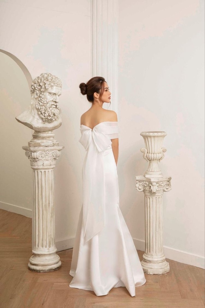 Bu nikah elbisesinin modeli nasıl sizce?