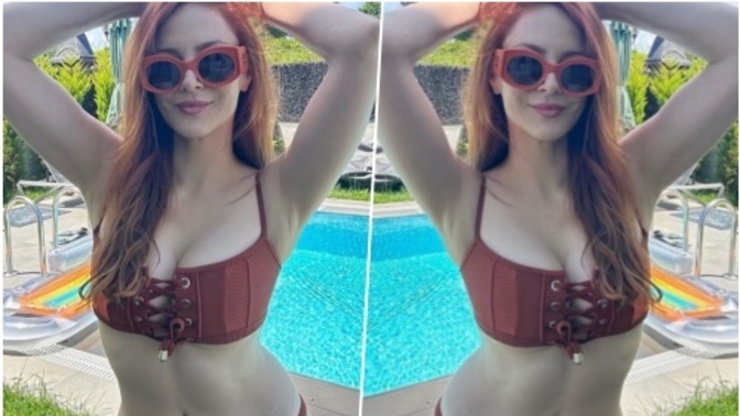 Mine Tugay bikinisiyle çok seksi değil mi?