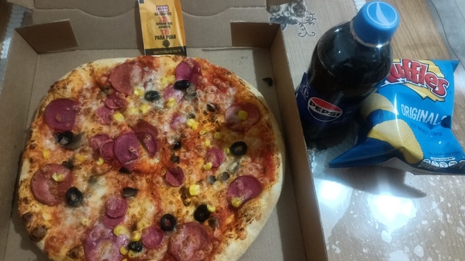 Orta boy pizzayı tek başınıza yiyebilir misiniz?