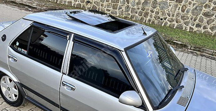 Fabrikadan çıkışlı orijinal sanruflu yüksek göğüs 1996 üstü kasa doğan slx 1.6 i. e paket gördünüz mü hiç orijinal kalanlardan?