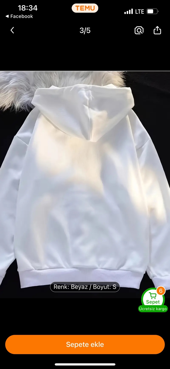 Sweatshirt buldum kelebekli. Nasıl görünüyor?