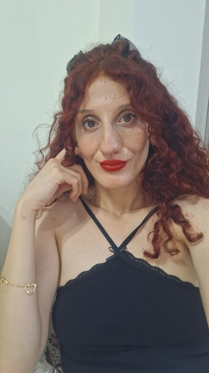 Kırmızı ruj bana olmuş muu?