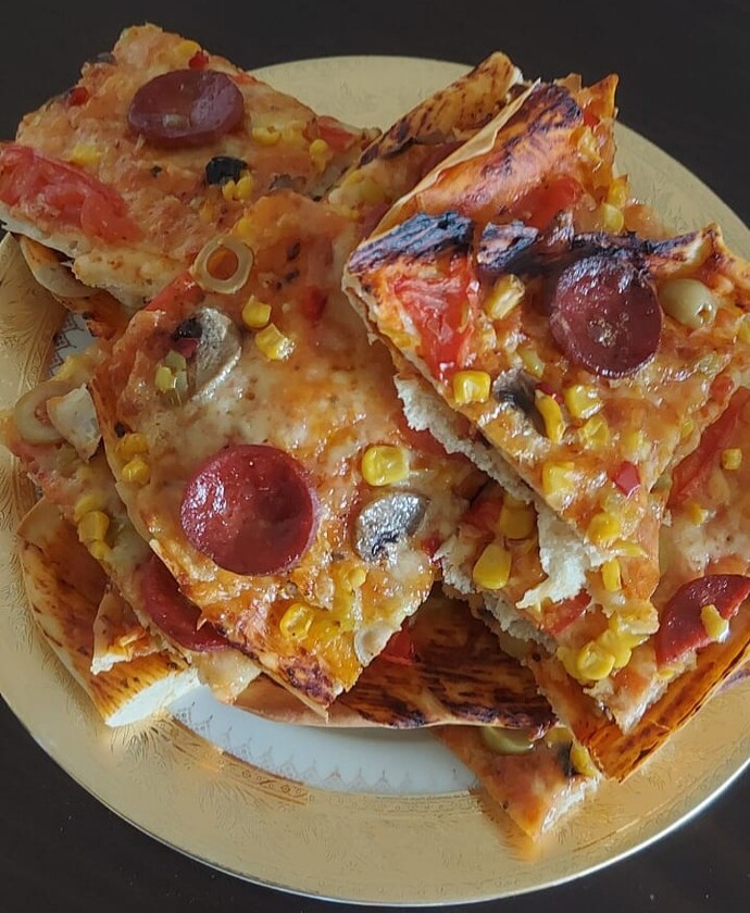Pizzayı kalın hamurlu mu seversiniz, ince mi?