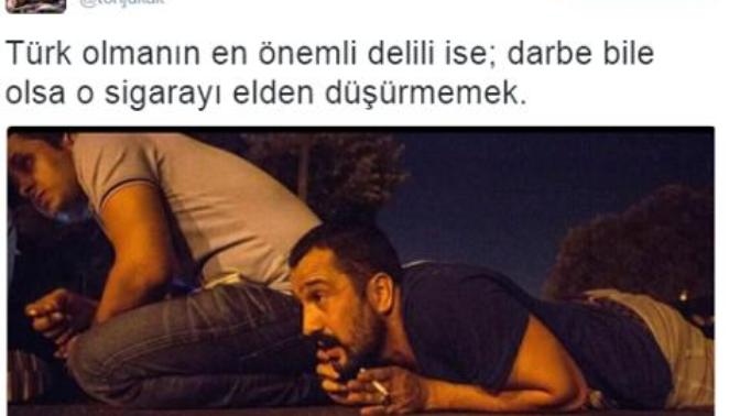Darbe olurken sigara içen adam hakkında ne düşünüyorsunuz (resimli) :) ?