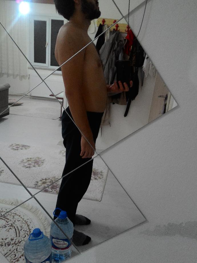 Dik duruyorum ama kambur gibi mi gözüküyorum fotoda?