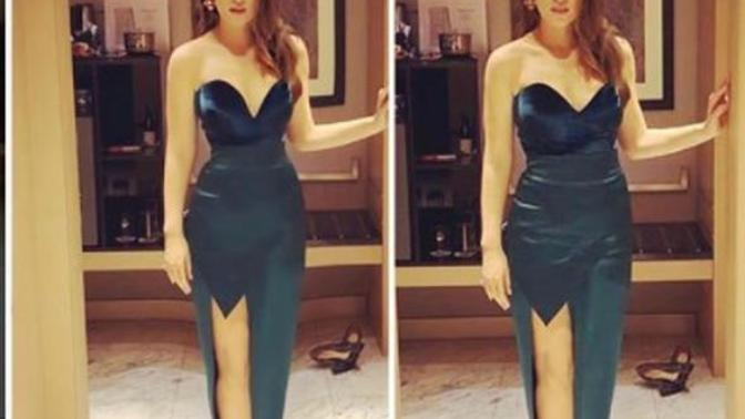 Demet Evgar'ın Aile Arasında filminin galasındaki kıyafetini nasıl buldunuz?