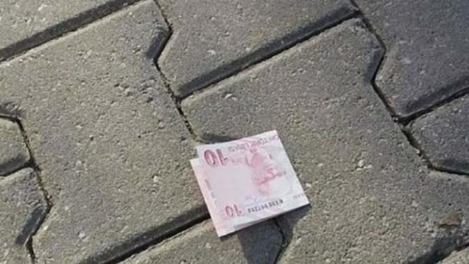 Yerde para bulsan alır mısın?