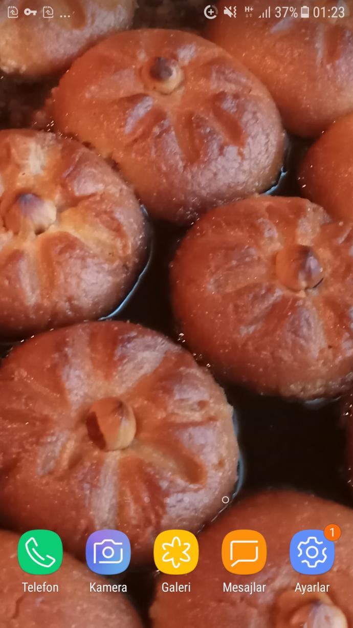 Kilit ekranda kullandiginiz duvar kagidi nasil?